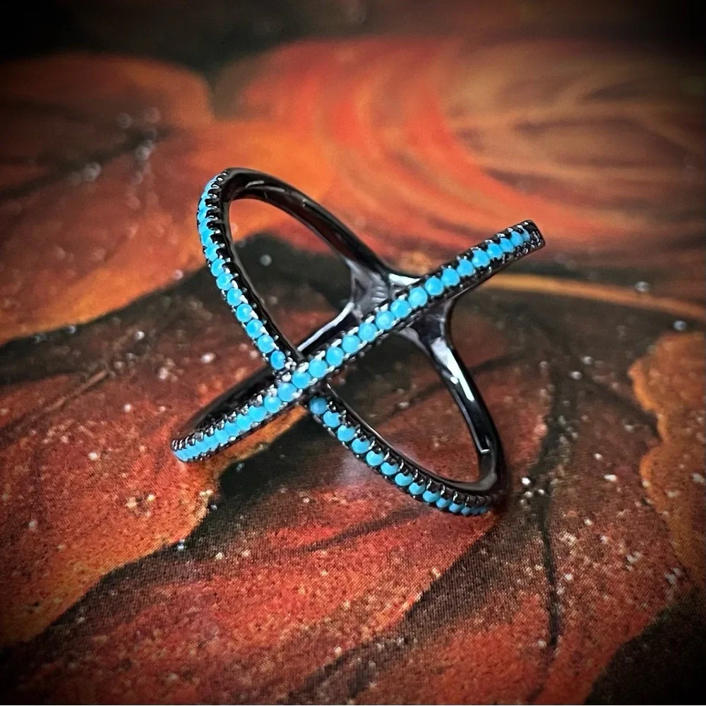 Crossed Sterling Silver Ring with Faceted Blue Crystals gunmetal 925